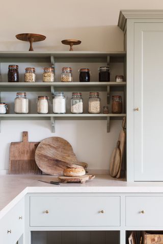 Jars on shelves in kitchen