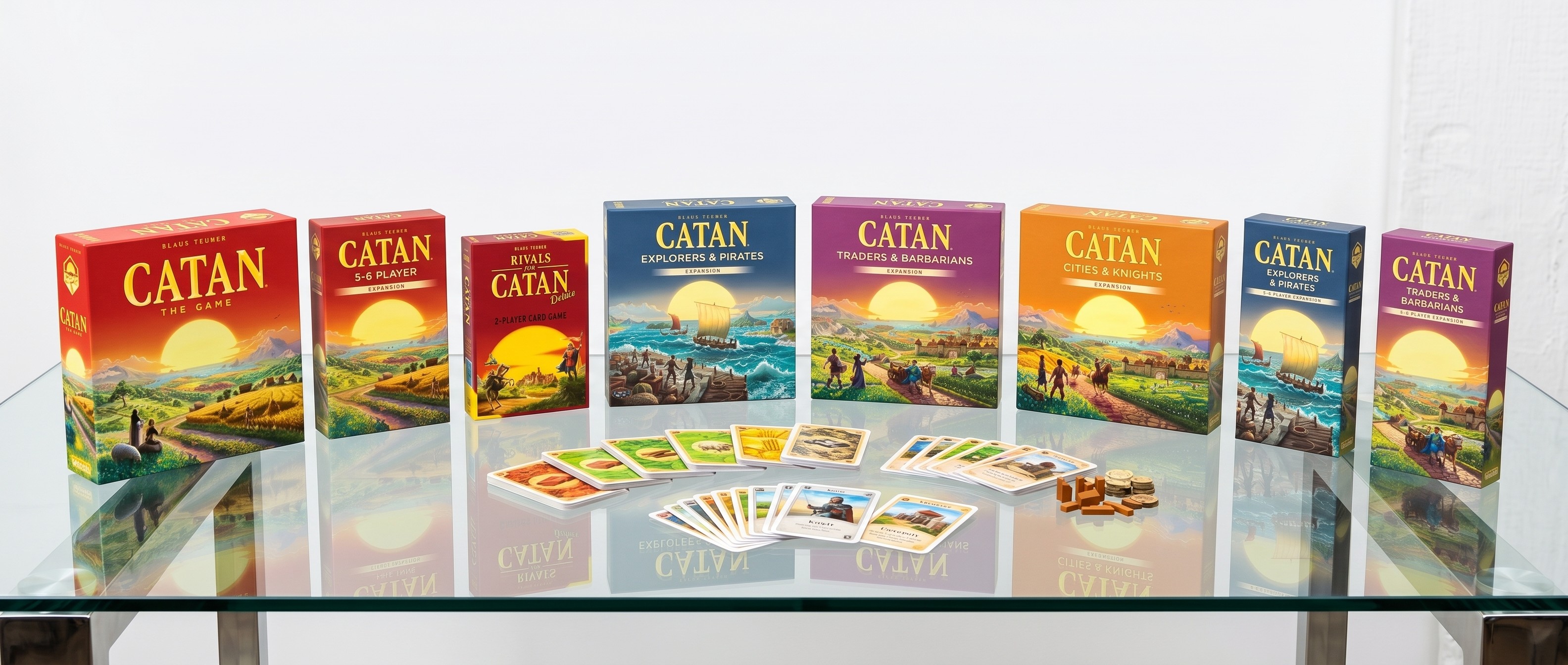 The Catna games and expansions next to each other.
