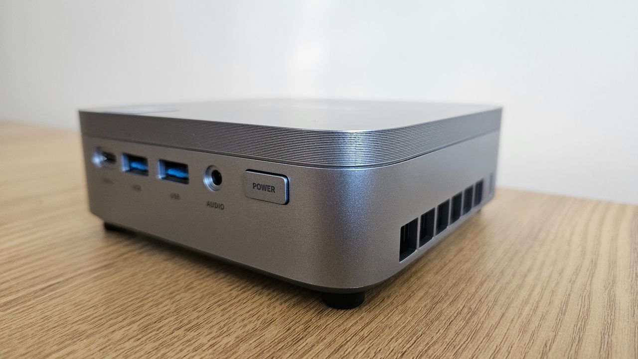 The Acemagic Kron Mini K5 PC on a desk