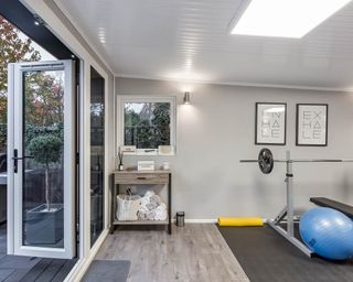 A home gym set up in an extension/garden room
