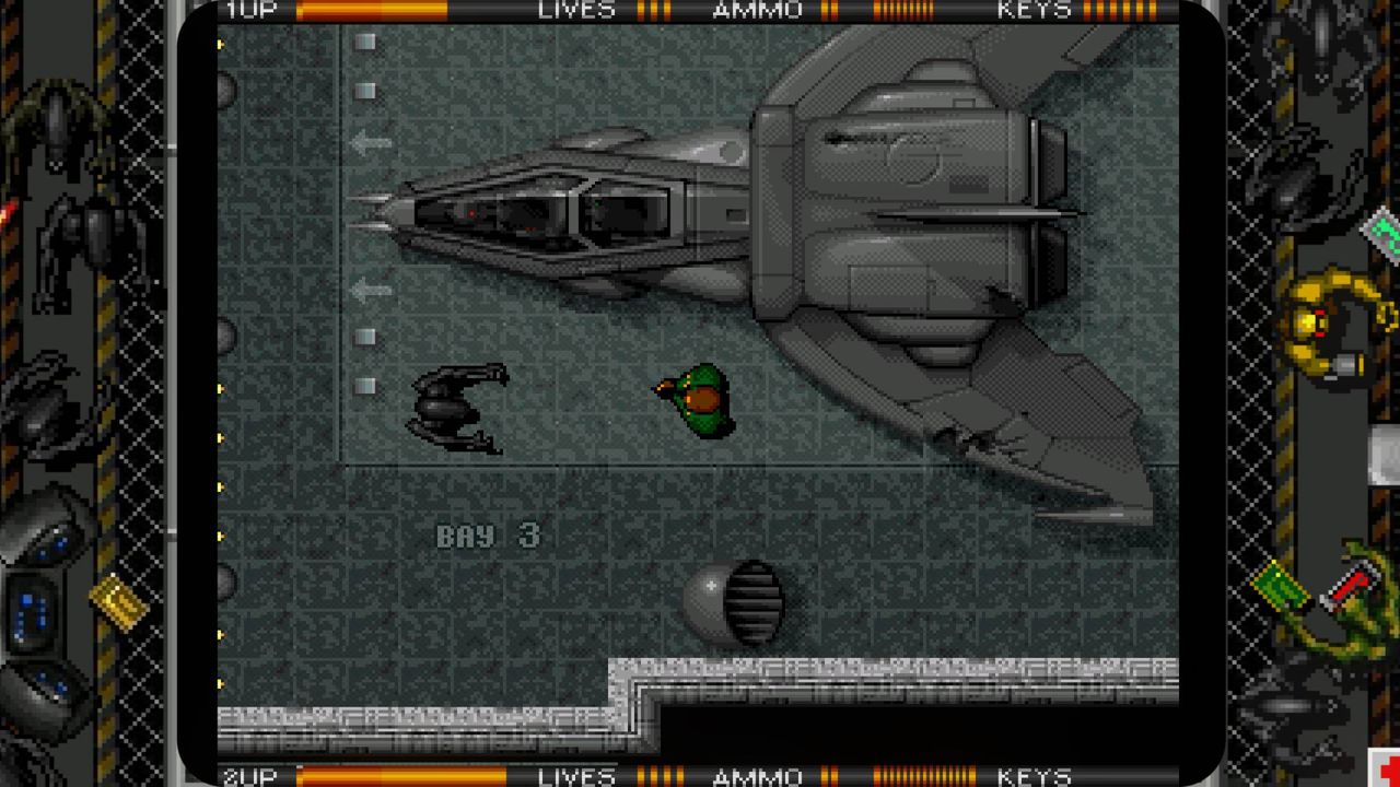 Alien Breed Special Edition gameplay screenshot with player facing enemy.