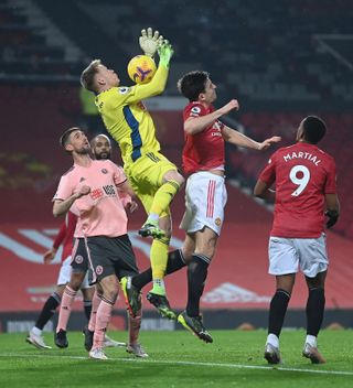 Harry Maguire was adjudged to have fouled Sheffield United goalkeeper Aaron Ramsdale before Anthony Martial found the net