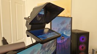 Elgato Prompter review from the side, next to a vertical gaming monitor