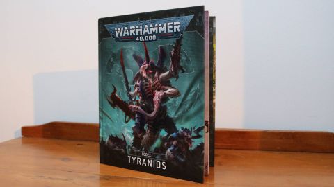 The Tyranid Codex on a wooden table