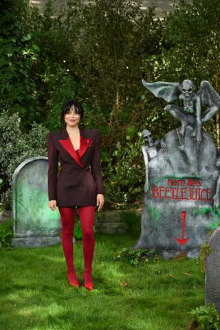 Jenna Ortega Pays Tribute to Michael Keaton s Iconic Beetlejuice Tux in Chic Blazer and Blood Red Platforms Marie Claire