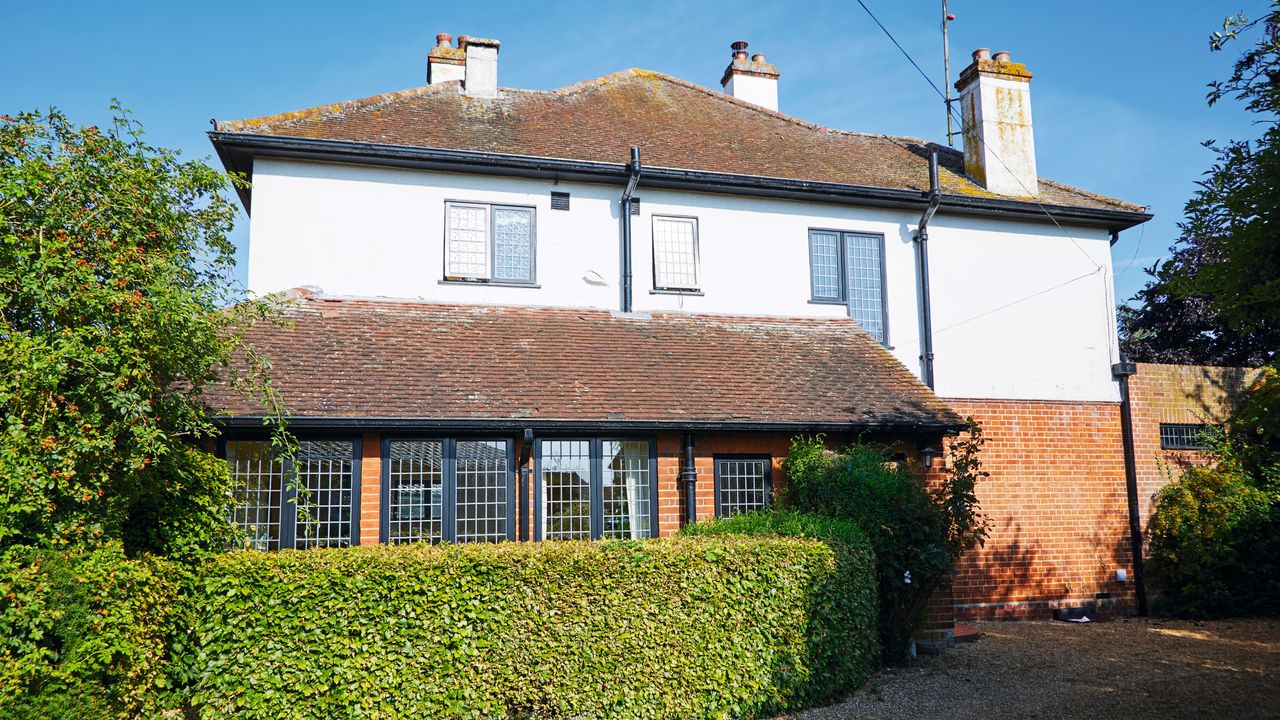 Cottage house exterior with windows