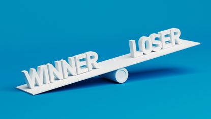 "winner" and "loser" written out in white lettering on a scale with a blue background