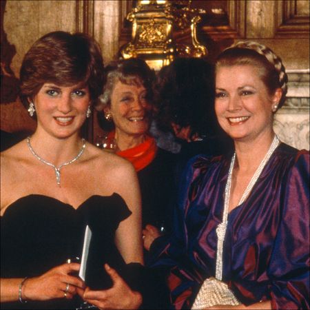 Princess Diana wears a strapless black taffeta Emanuel dress and poses next to Princess Grace Kelly of Monaco and King Charles on March 9, 1981 in London, United Kingdom