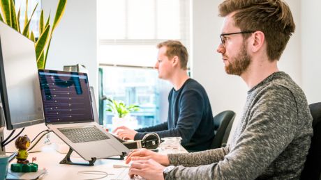 two boys watching desktop