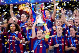 Alexia Putellas of Barcelona and Spain lifts the trophy after winning with her team the UEFA Women's Champions League 2023/24 Final match between FC Barcelona and Olympique Lyonnais at Estadio de San Mames on May 25, 2024 in Bilbao, Spain. 