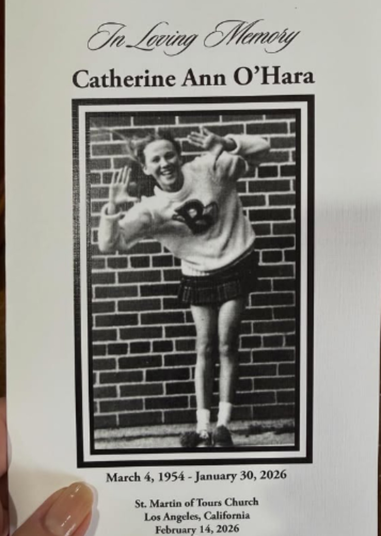 A program that says &amp;quot;In loving memory Catherine Ann O'Hara&amp;quot; and below a photo of her smiling it says &amp;quot;March 4, 1954-January 30, 2026 St. Martin of Tours Church, Los Angeles, California February 14, 2026.