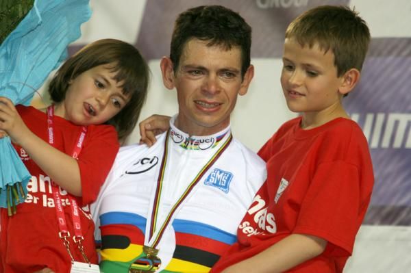 An emotional Joan Llaneras (Spain) with his children after he won the points race