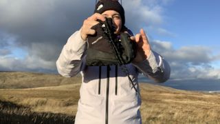 Hiker showing how flexible barefoot hiking shoes are