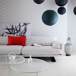 Neutral modern living room with globe lanterns
