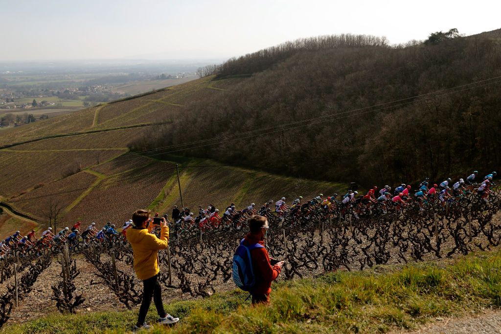 CHIROUBLES FRANCE MARCH 10 Stefan Bissegger of Switzerland and Team EF Education Nippo Yellow Leader Jersey the peloton during the 79th Paris Nice 2021 Stage 4 a 1875km stage from ChalonSurSane to Chiroubles 702m Vineyards Public Fans Landscape ParisNice on March 10 2021 in Chiroubles France Photo by Bas CzerwinskiGetty Images