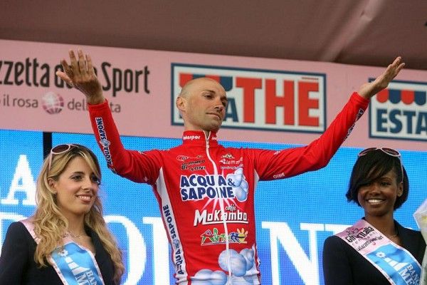 Stefano Garzelli on the podium to receive his jersey for leading the mountains classification.