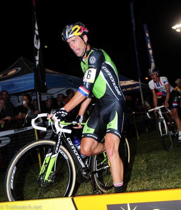 Tim Johnson (Cannondale-Cyclocrossworld) leading Powers over the barriers
