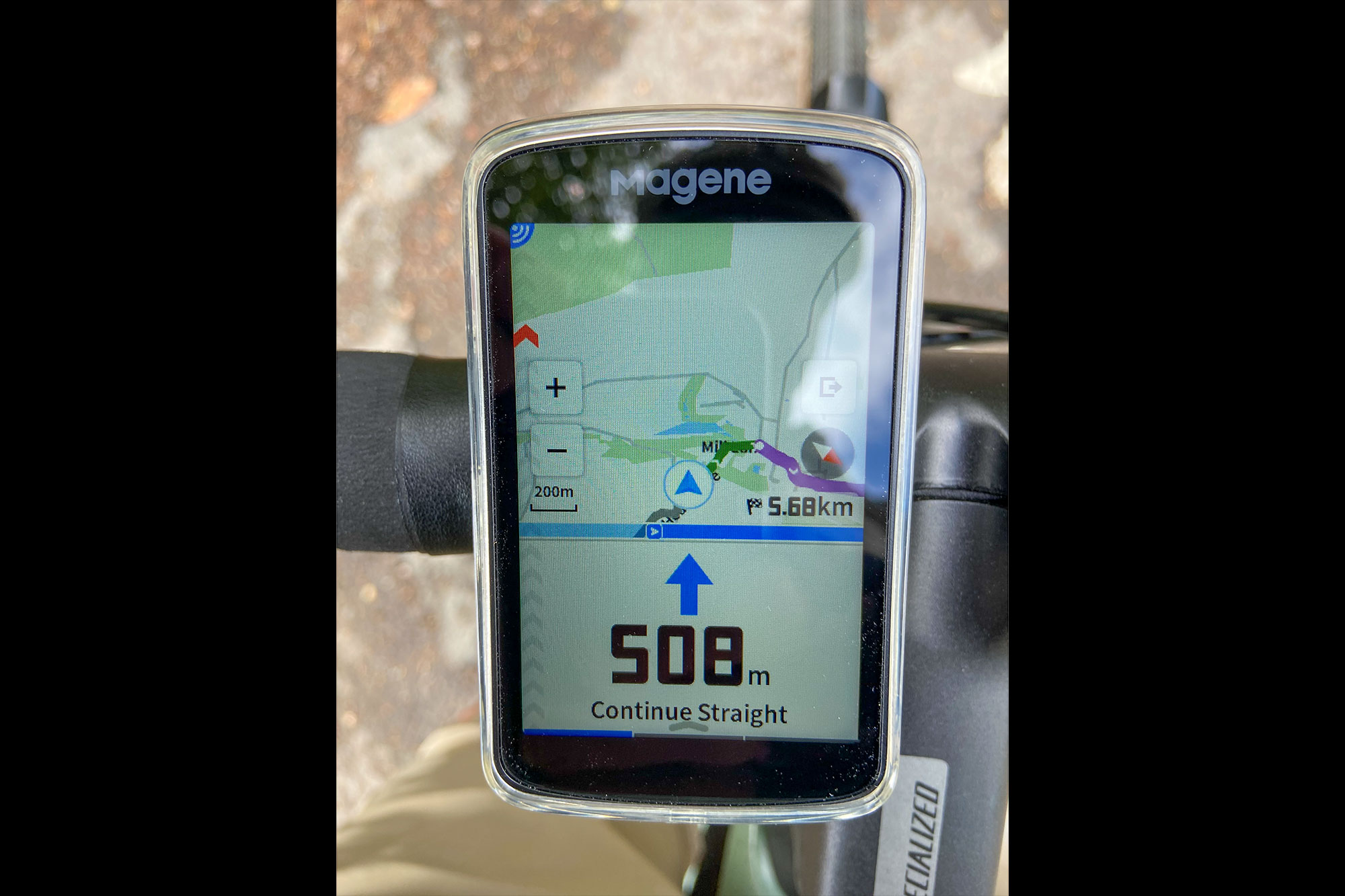 Magene C706 displaying navigation screen where re-routed road rejoins original route.
