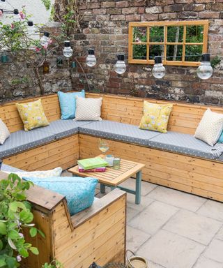 garden area with sofa and cushions