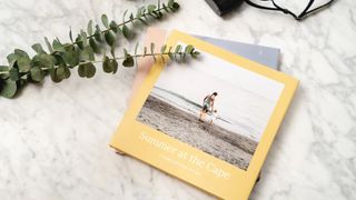 Mimeo photo book on table