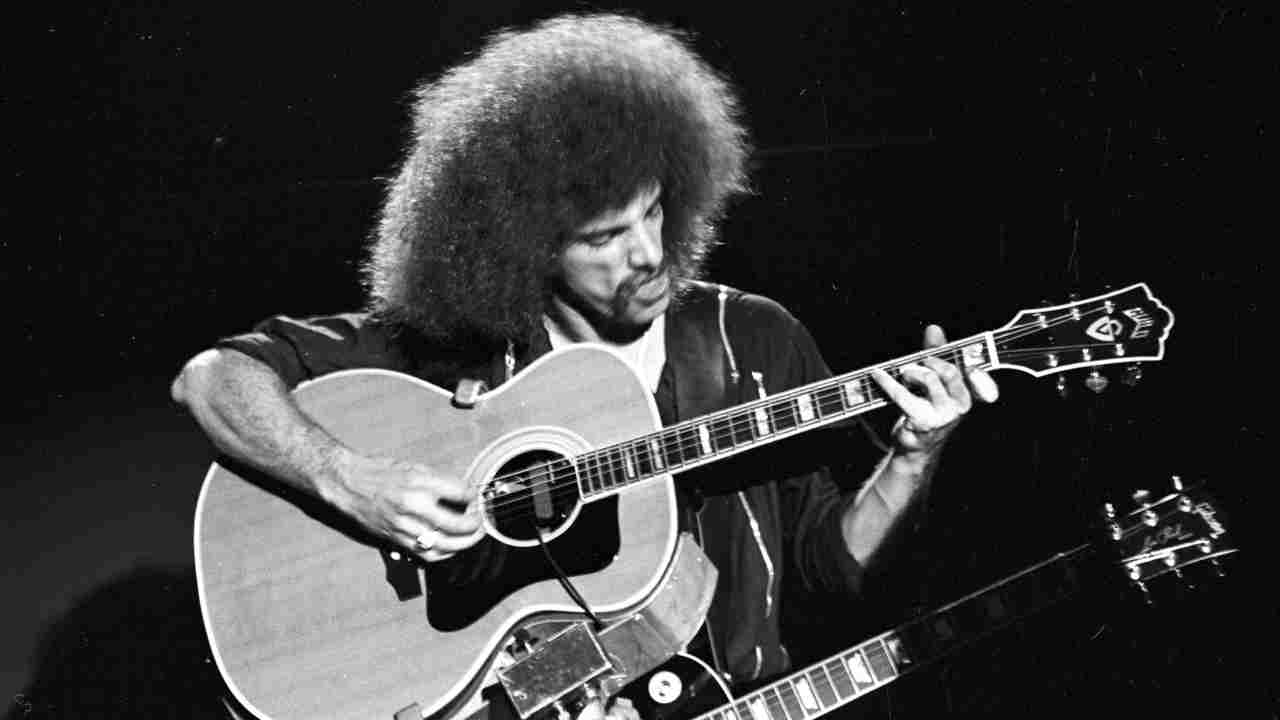 Journey’s Neal Schon performing onstage in 1978