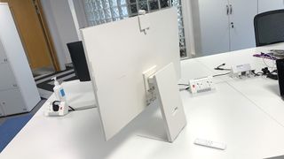 A Samsung M8 monitor on a desk