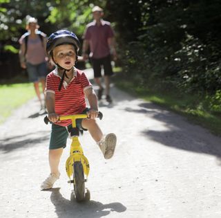 Young boy on a balance bike