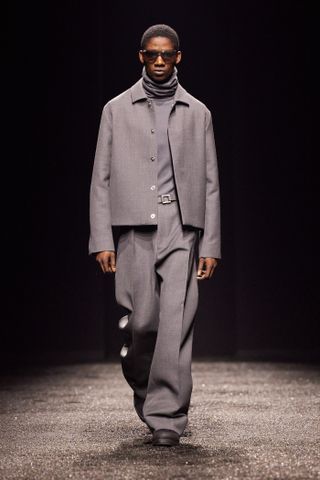 Man on Zegna runway in grey suit