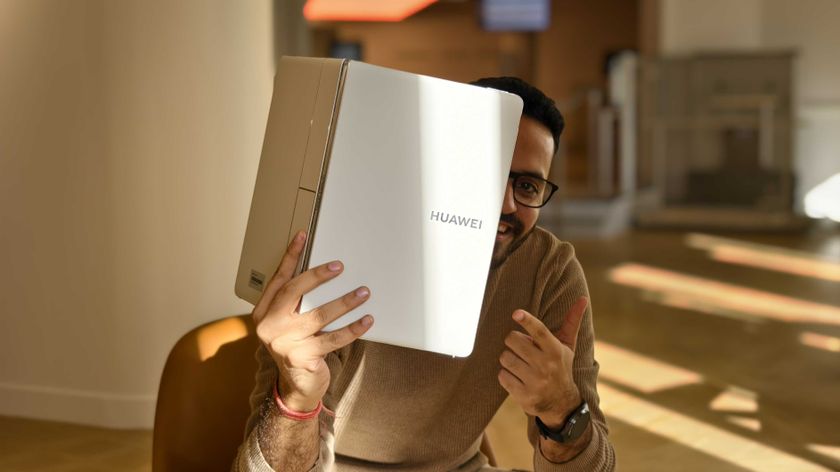 Prakhar Khanna holding the Huawei MateBook Fold.