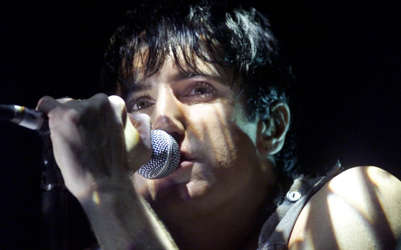 Trent Reznor looking out on stage
