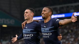 Phil Foden and Gabriel Jesus celebrate a goal in Manchester City's win at Leeds.