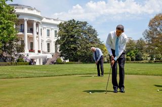 President Obama and Vice President Joe Biden on the White House putting green. Credit: Getty Images