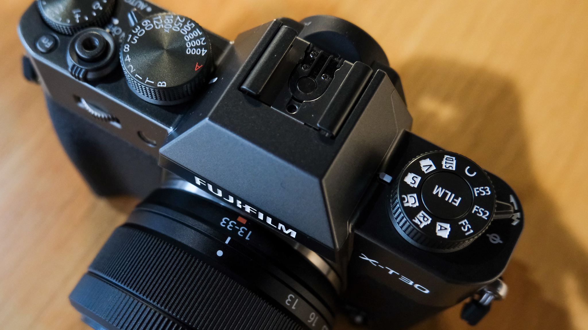 A charcoal Fujifilm X-T30 III mirrorless camera