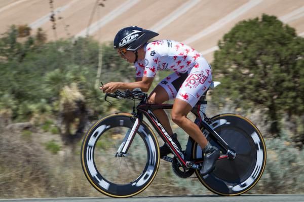 Carmen Small (Optum) riding to third.