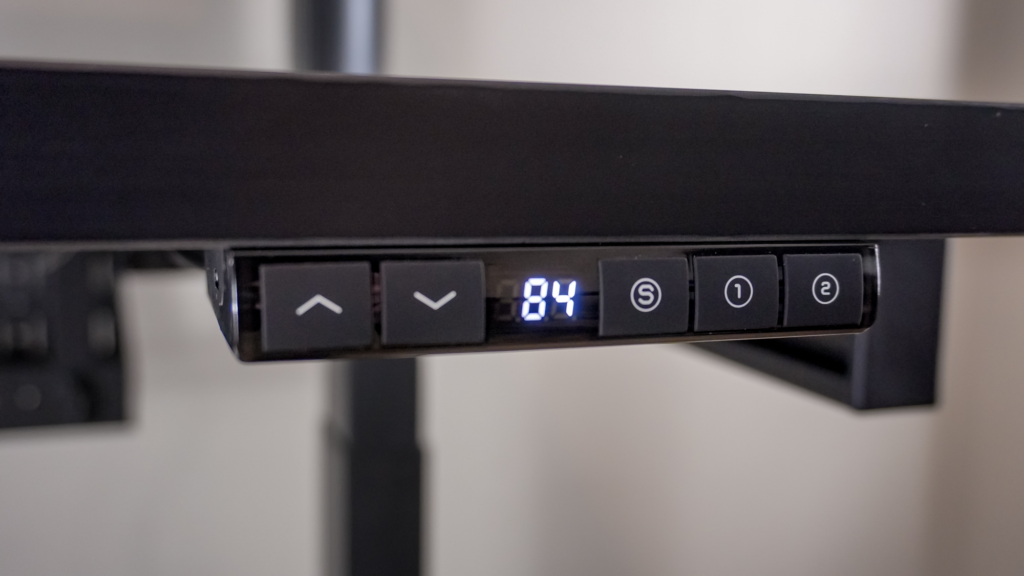 A close-up shot of the Corsair Platform 4: Elevate Desk's keypad