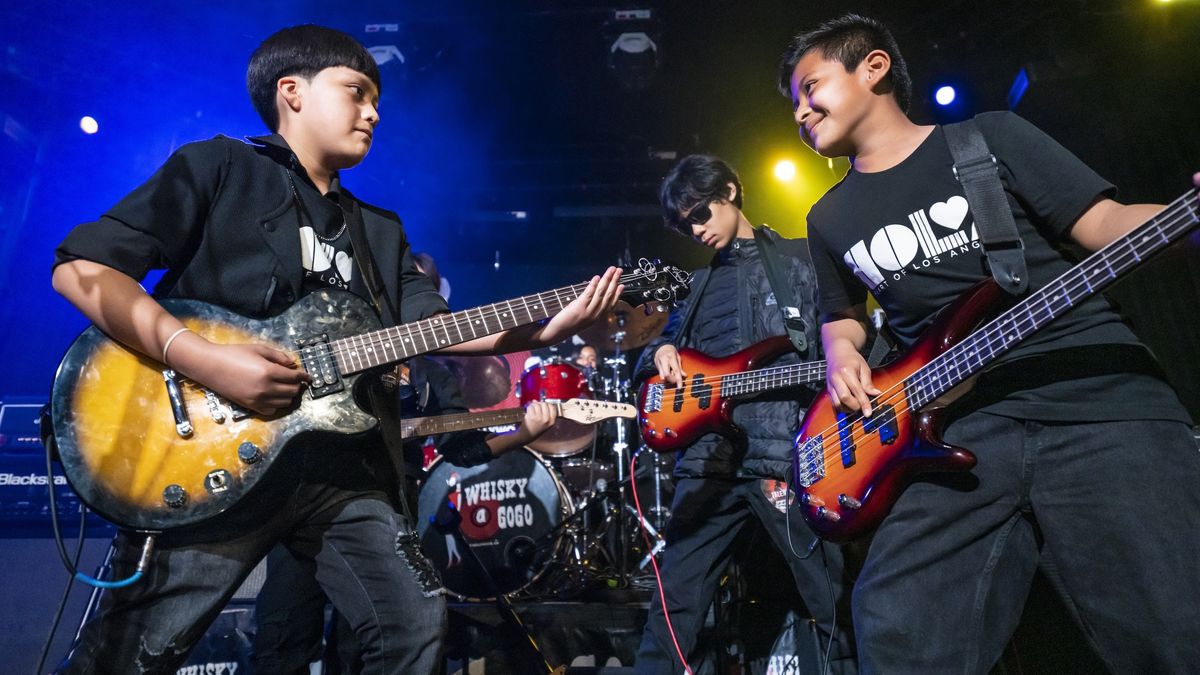 Students jam together in a rock band as part of Heart of Los Angeles&#039; music education program. 