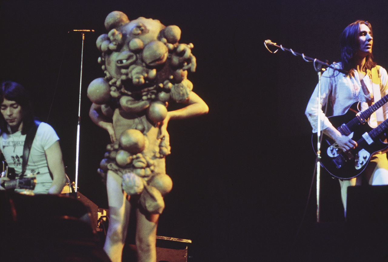 Rock band Genesis on stage, circa 1974. (Photo by Michael Putland/Getty Images)