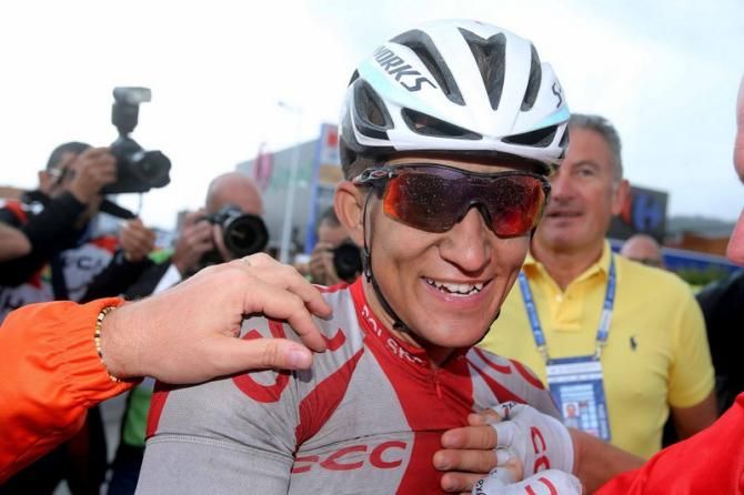 Michal Kwiatkowski (Poland) is congratulated after claiming the win