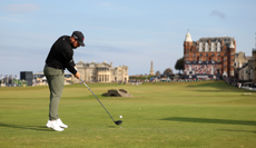 Tyrrell Hatton strikes a tee shot off the 18th tee at St Andrews