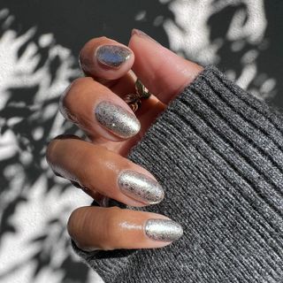 @themaniclub silver almond nails