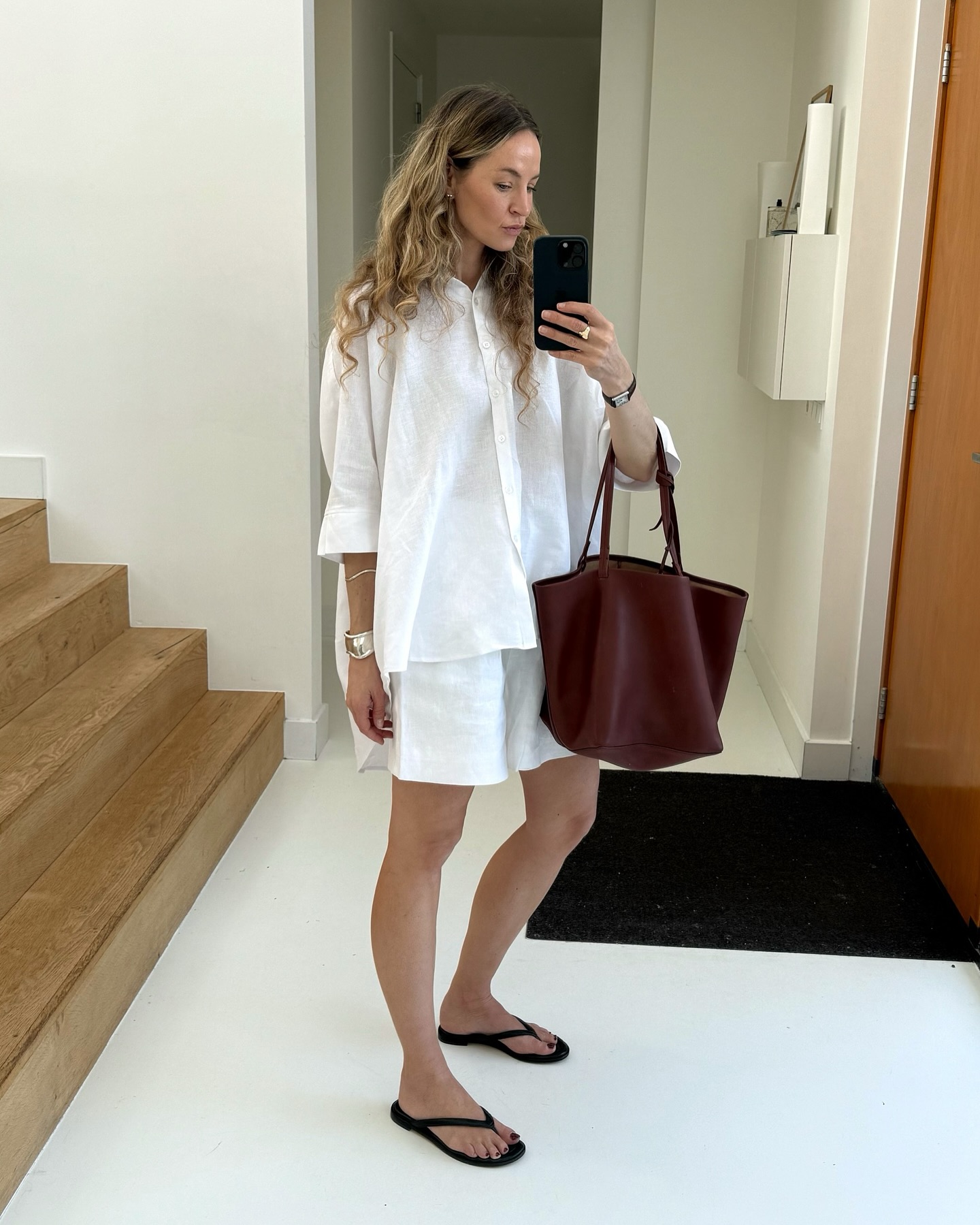 An image of @anoukyve wearing a white cotton shirt and trousers from Matteau, an Australian fashion brand to know.