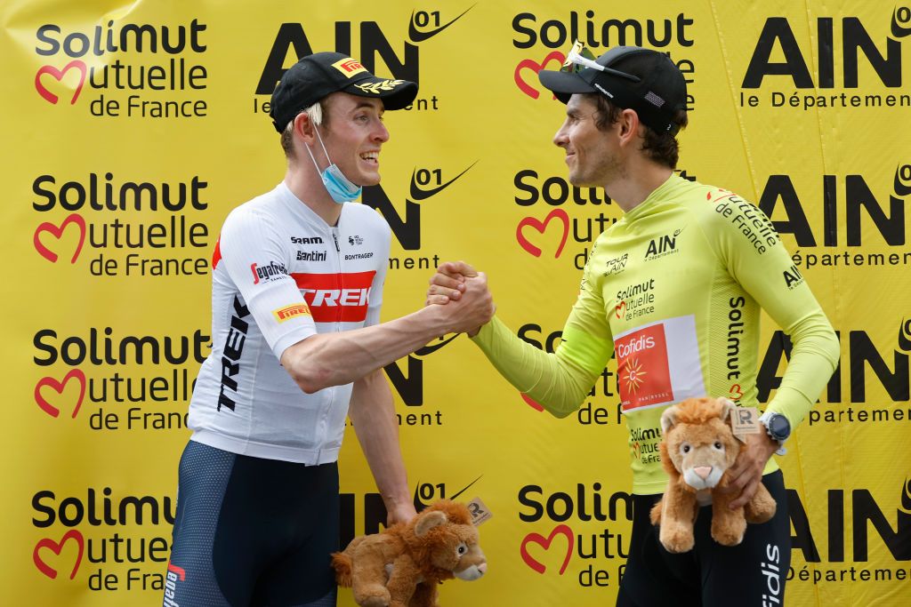 LLEX FRANCE AUGUST 11 LR Mattias Skjelmose Jensen of Denmark and Team Trek Segafredo on second place and race winner Guillaume Martin of France and Team Cofidis pose on the podium ceremony after the 34th Tour de lAin 2022 Stage 3 a 131km stage from Plateau dHauteville to Llex 904m TDA22 on August 11 2022 in Llex France Photo by Bas CzerwinskiGetty Images
