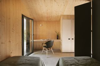 Timber clad interior at Pine Nut Cabane by daab design