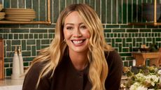 hilary duff on a green background