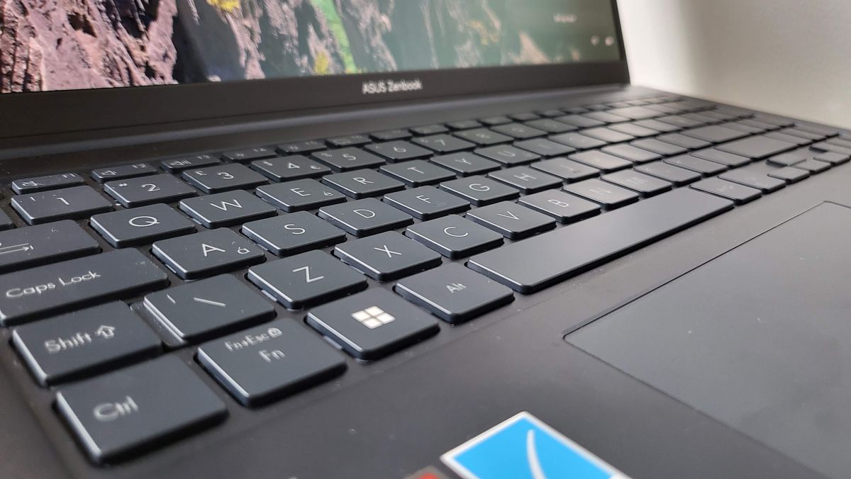 Asus Zenbook OLED 15 (2023) on a shelf