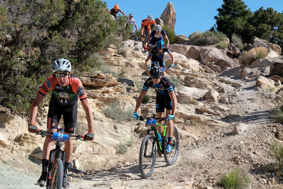 Nick Gould (Ska Brewing) leading a long train of racers down some very rocky terrain