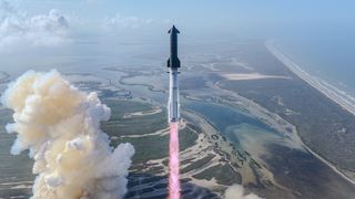 a large silver rocket launches above a plume of fire