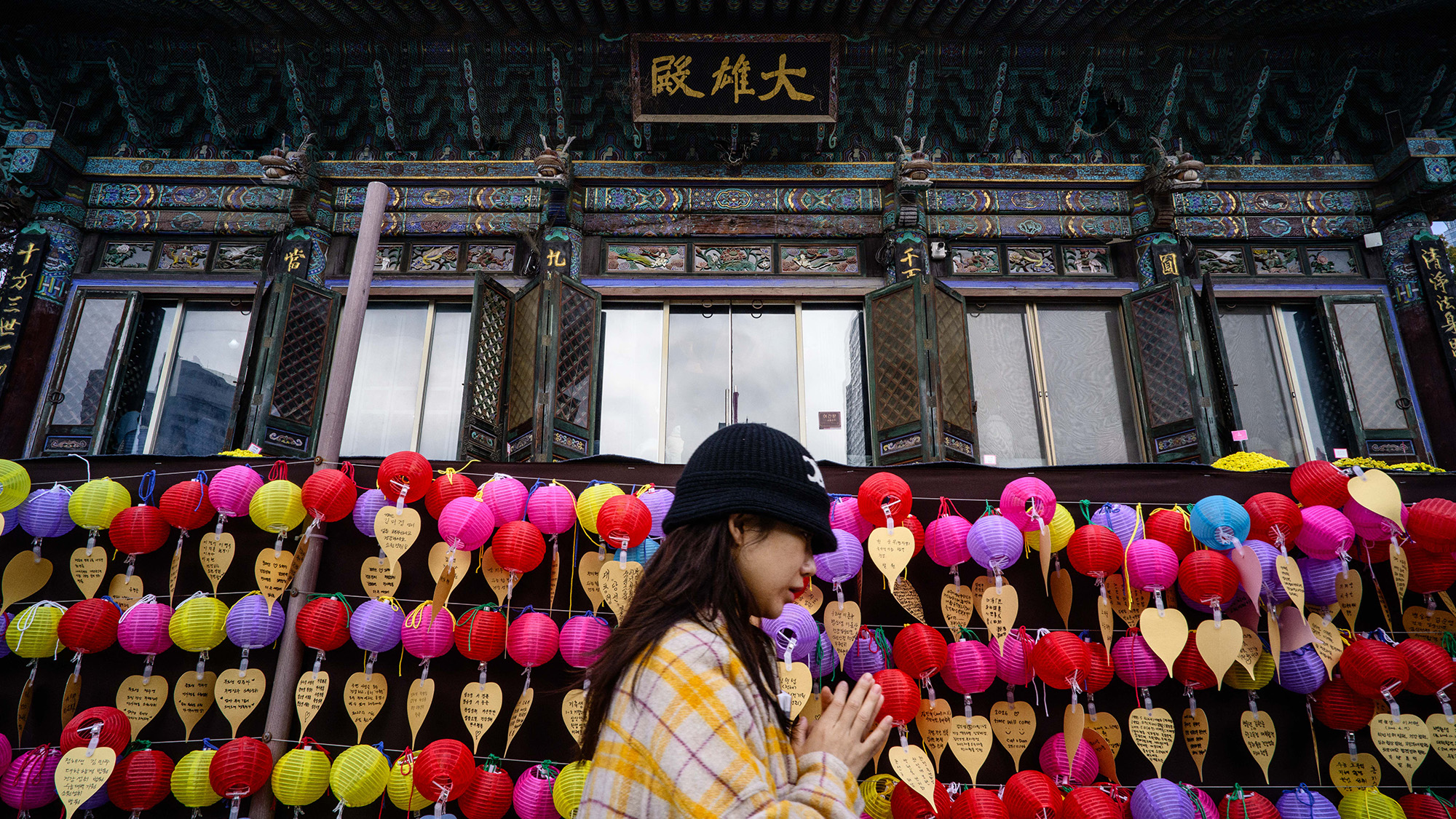 A South Korean Buddhist prays at the Bongeunsa Temple