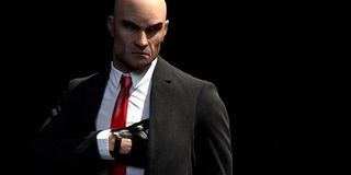 Agent 47 reaches for his gun in Hitman