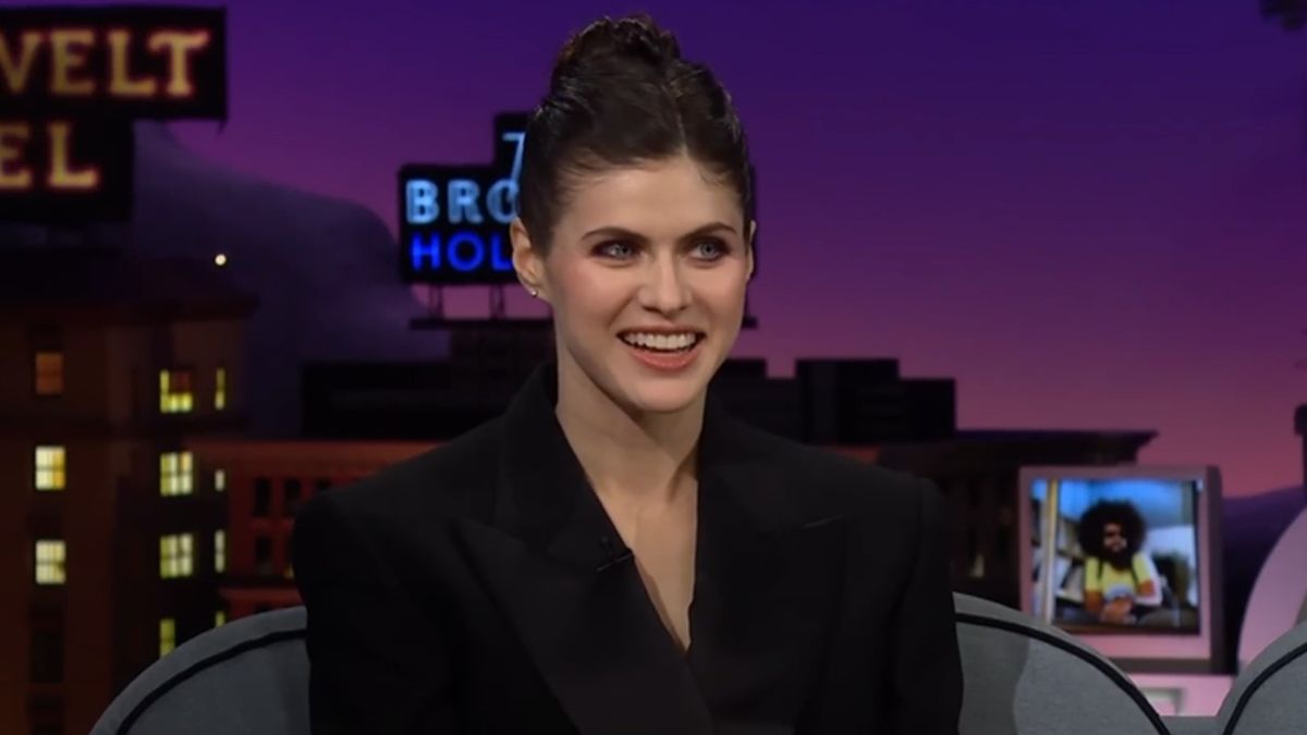 Alexandra Daddario smiling while on The Late Late Show.